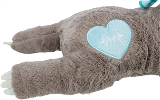 Detail van het blauwe hartje met hartslaglijn in de puppy knuffel